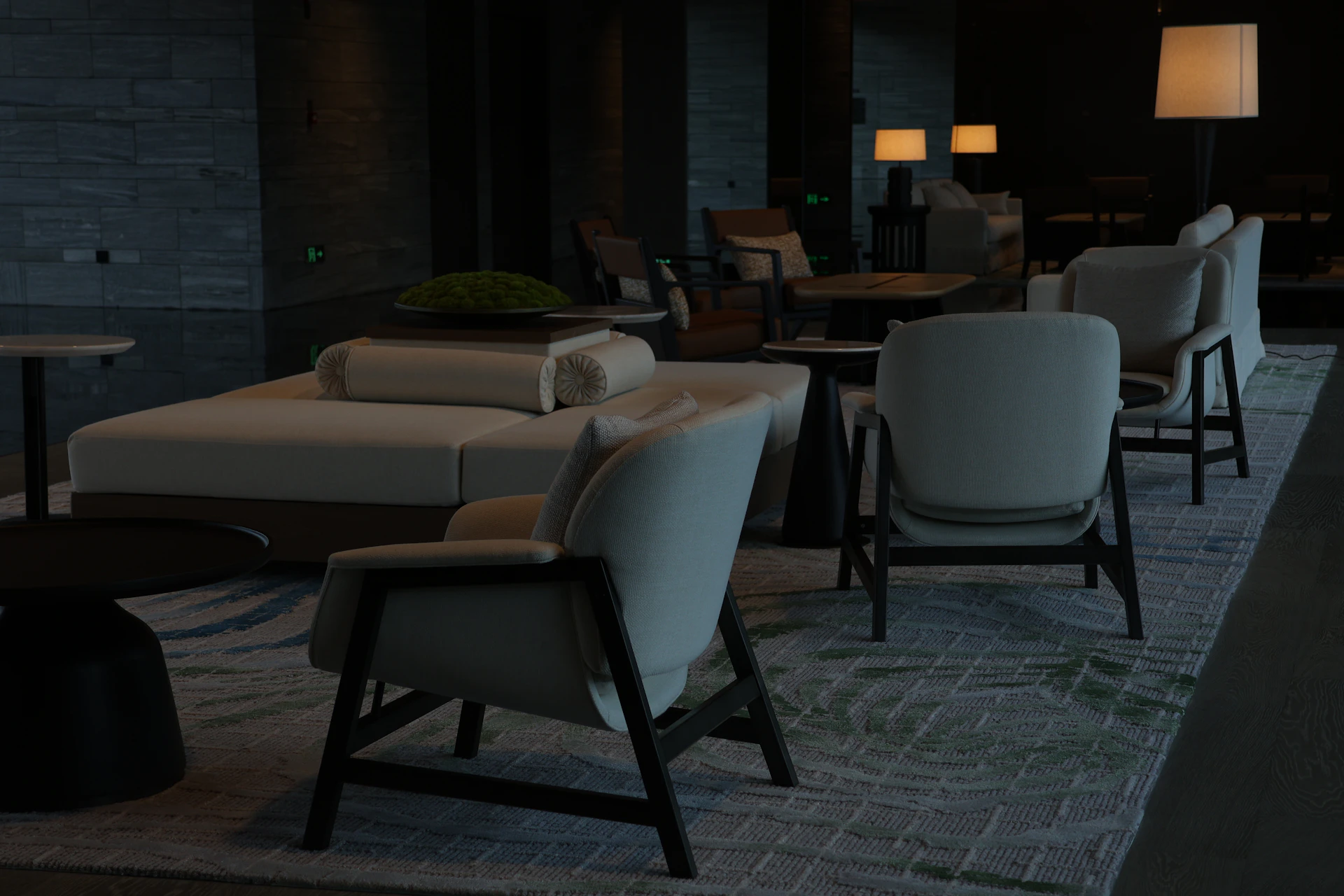 Commercial lounge seating in a moody, upscale interior