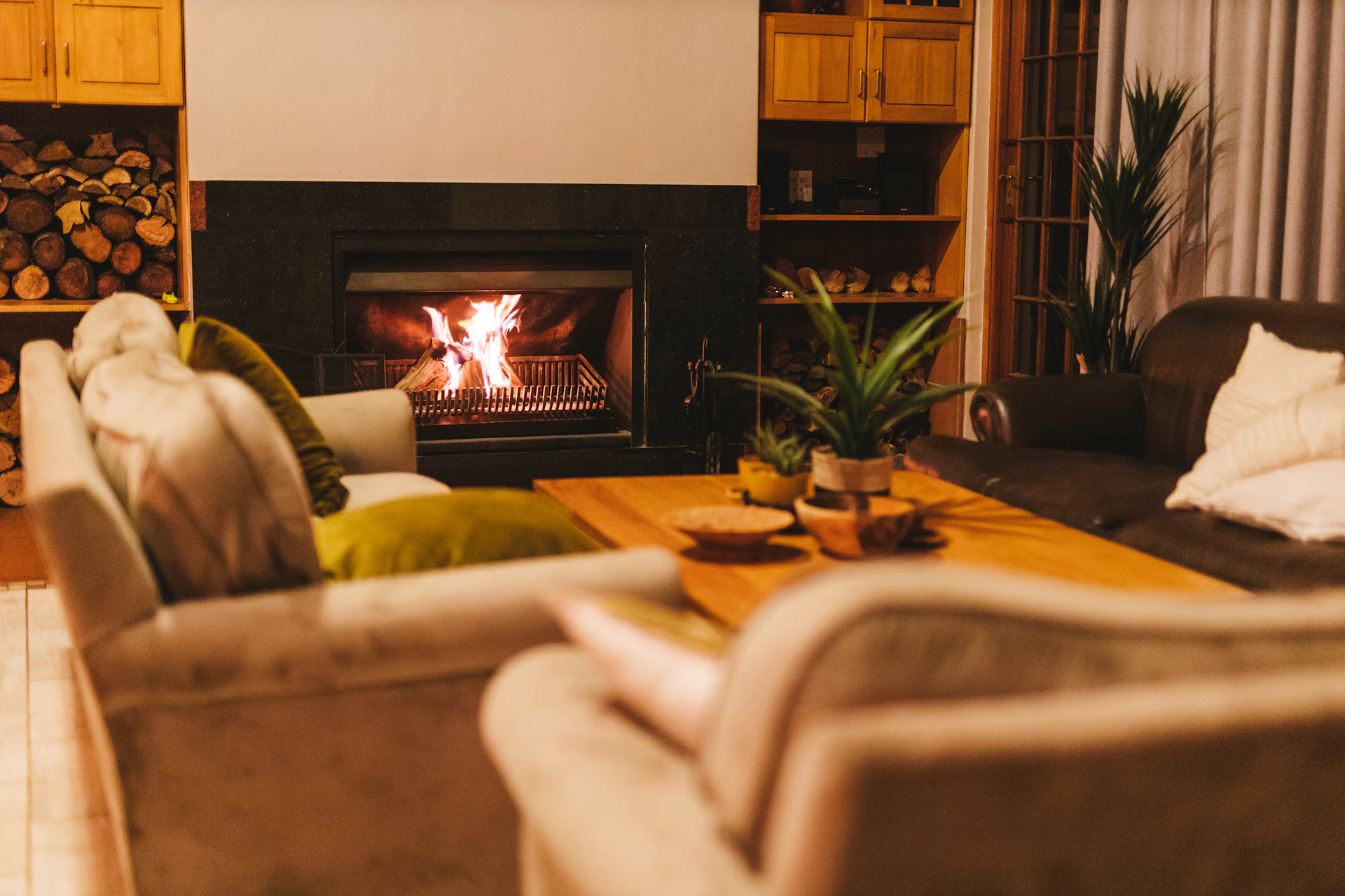 Warm residential living room furnished with upholstered seating